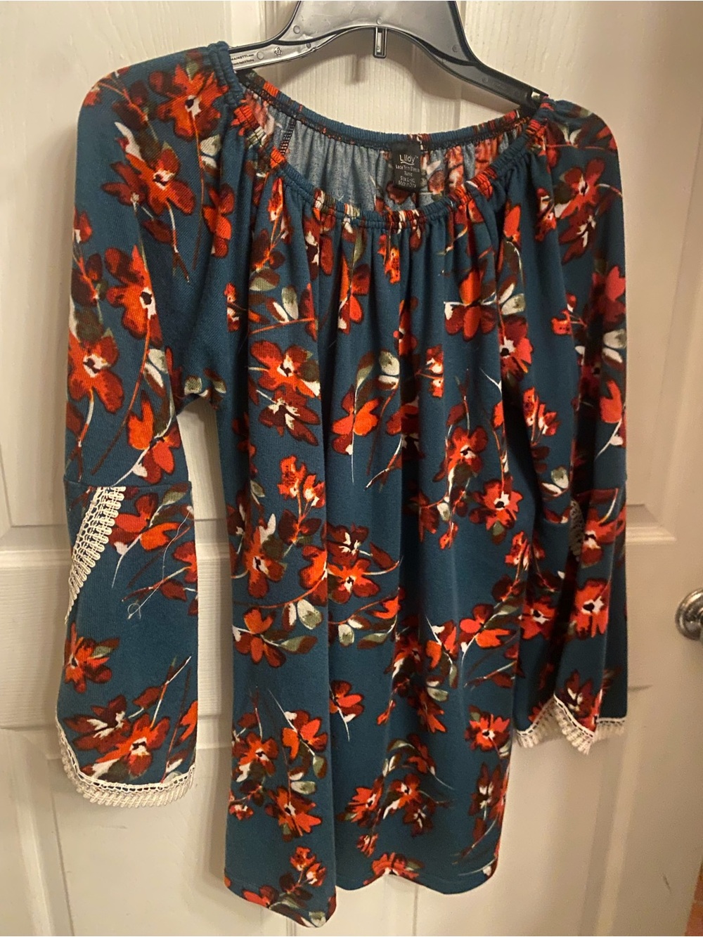 Beautiful Fall burgundy,red teal knit tunic with bell sleeves very forgiving